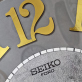 ساعت دیواری چوبی طوسی سیکو 70 سانتیمتری با اعداد پلکسی طلایی