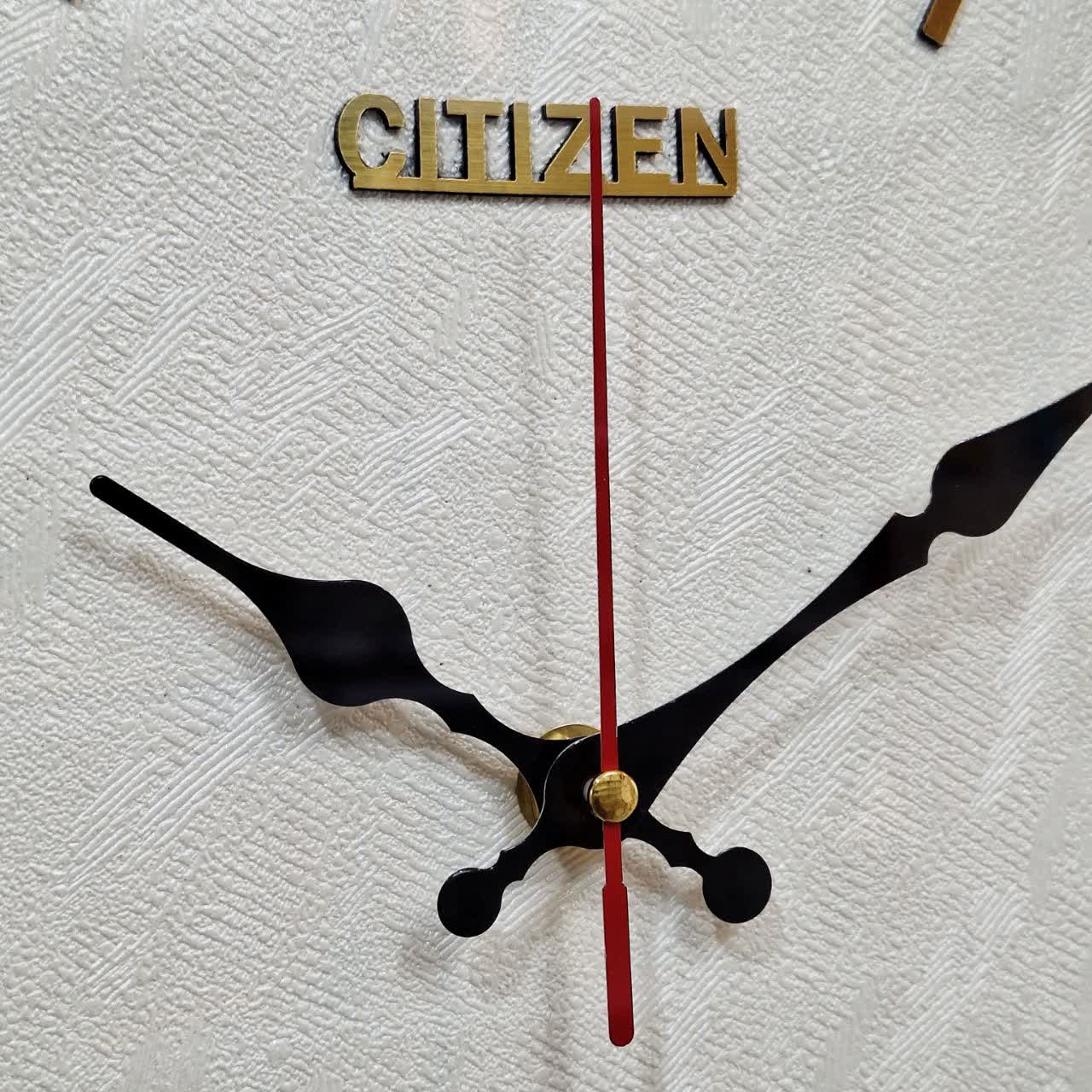 نمای نزدیک ساعت دیواری سیتیزن مشکی 35 سانتیمتری