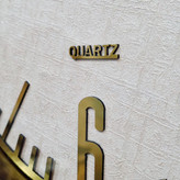 نمای نزدیک ساعت دیواری سیتیزن قهوهای 35 سانتیمتری