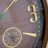 ساعت دیواری والرین قهوهای 70 سانتیمتری با اعداد پلکسی طلایی و موتور 3 موتوره از نمای موتور